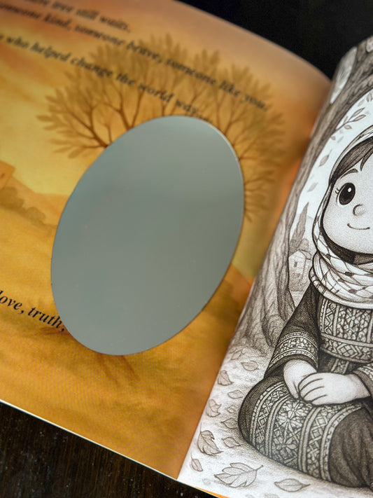 Illustrated book with a mirror showing the child as the hero